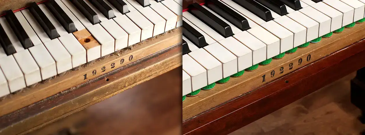 Close up view of piano keys before and after restoration.
